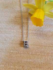 initials letter B met Zirkonia Joy de la Luz