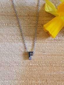 initials letter F met Zirkonia Joy de la Luz